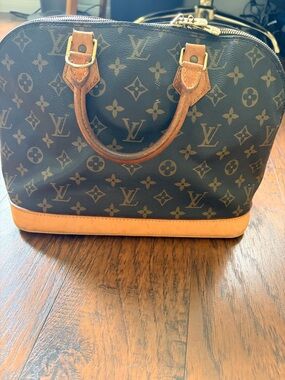 Louis Vuitton Brown Monogram Alma Handbag with Tan Trim